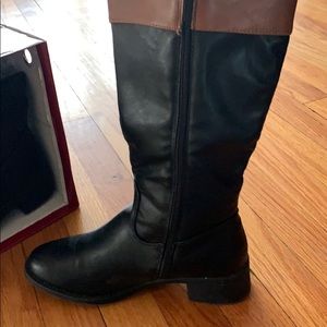 Black and brown rider boots